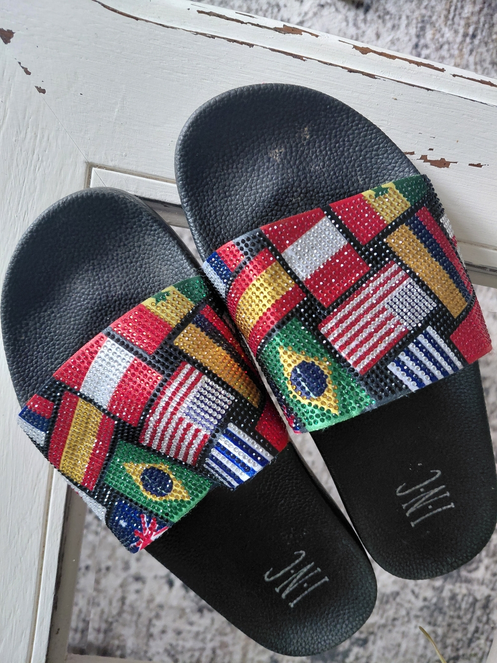 Womens Black Slide Sandals with Multicolor Flag Strap